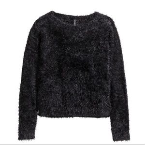 comfortable fuzzy black sweater